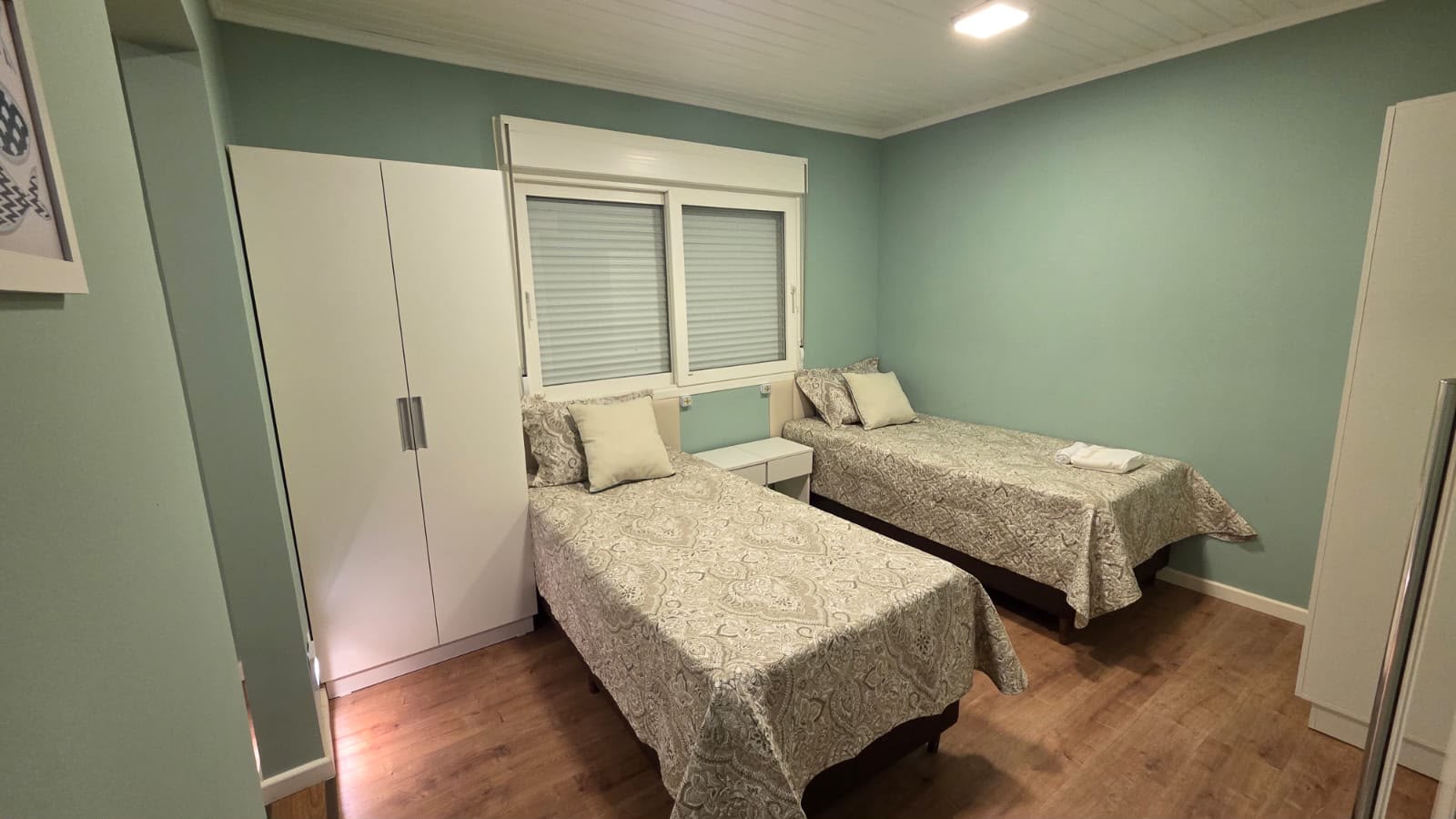 Quarto compartilhado acolhedor
